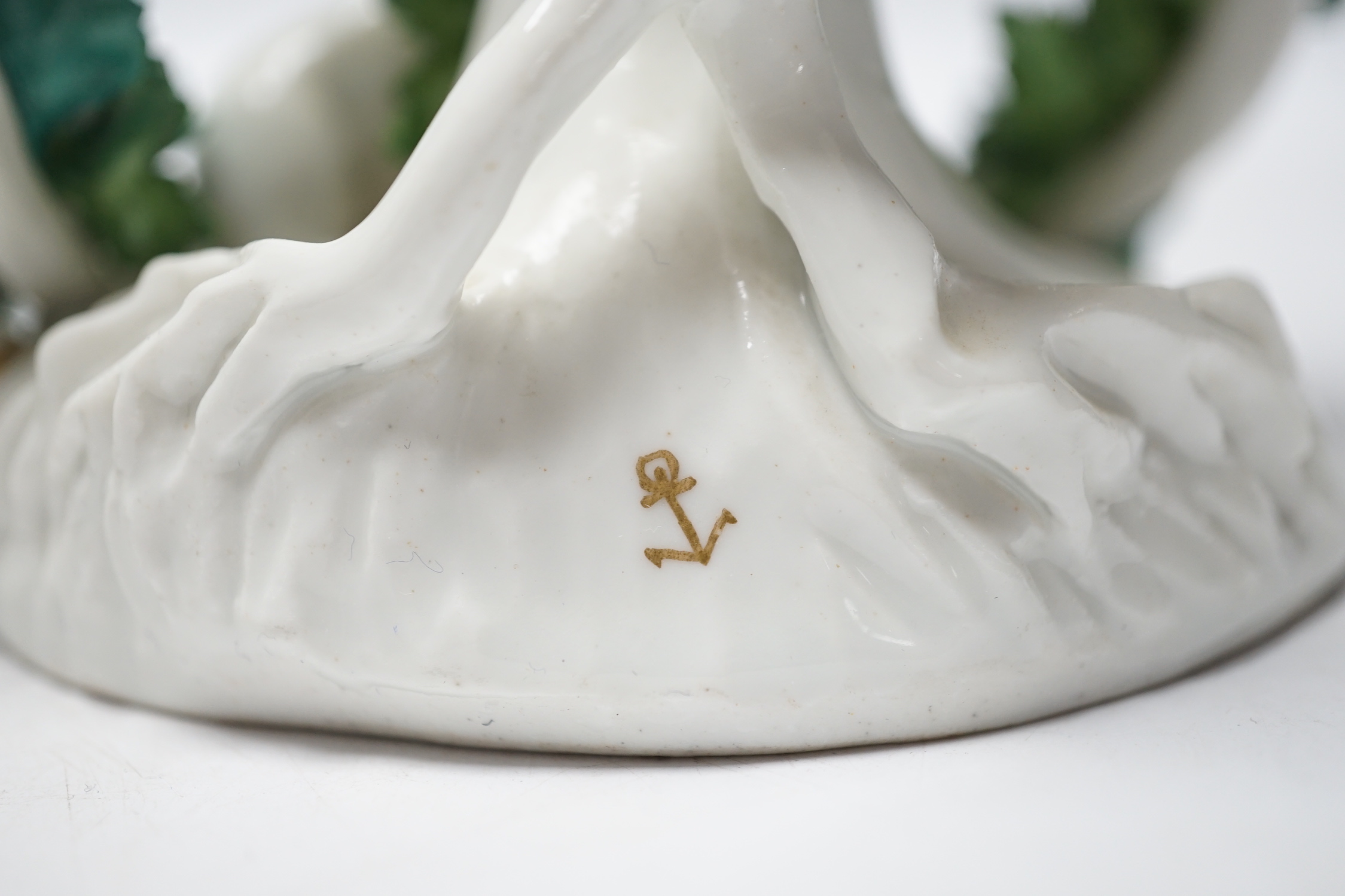 A pair of Samson porcelain chambersticks, in Derby style, with floral encrusted decoration, 19cm high